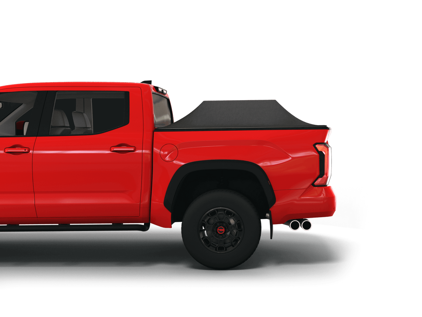 Red Toyota Tundra with Sawtooth Stretch tonneau cover expanded over cargo load
